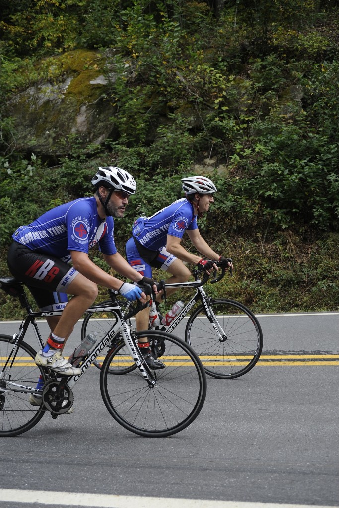 Jon and James Climbing Neel's Gap on their Team bikes